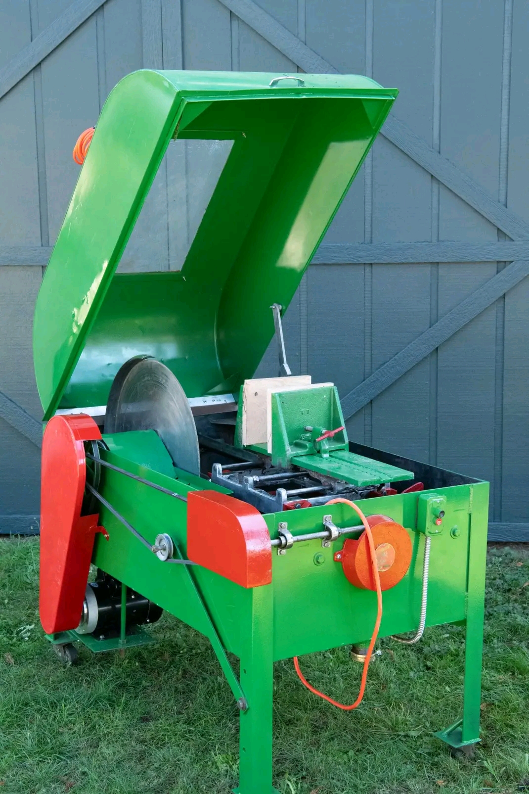24 inch slab saw with HP Precision Blade, powerfeed, cross-feed vise and 1.5 HP 110V motor
